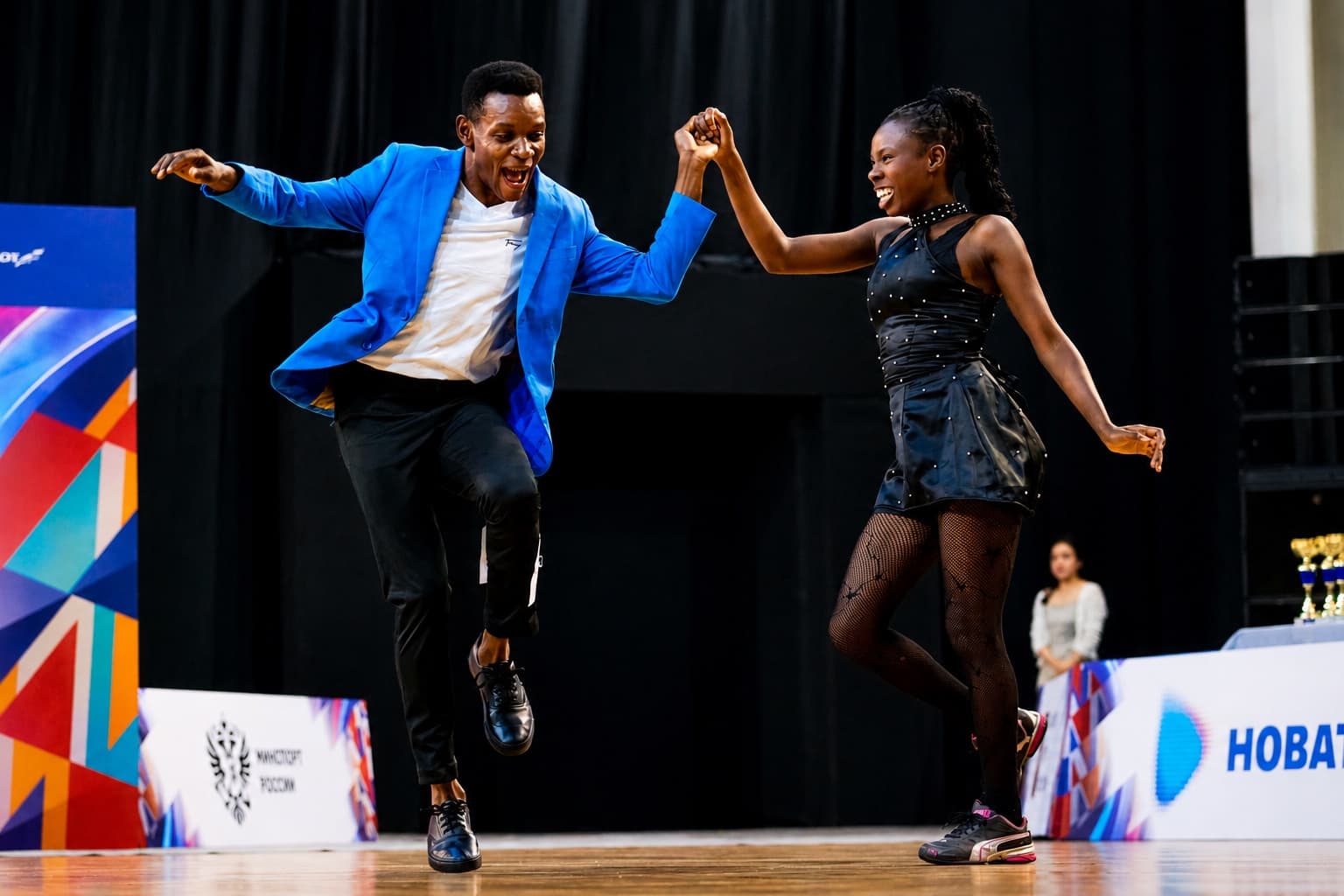 Two dancers performing on stage